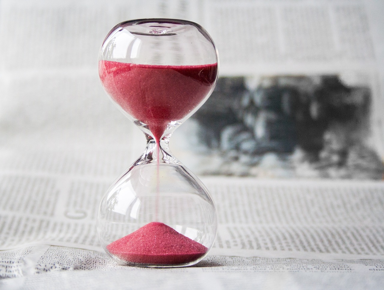 new year background hourglass time hours clock amount of time glass timer transcience sand