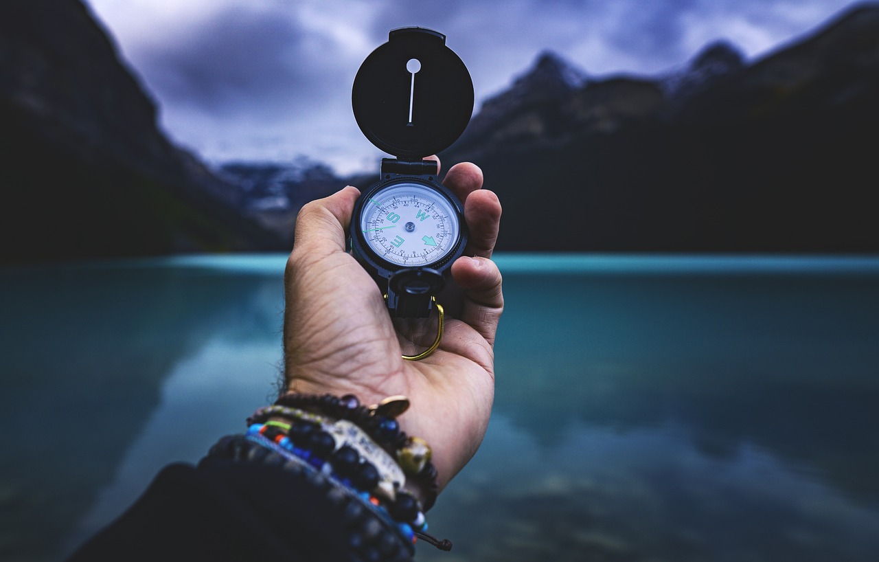 compass hand lake adventure exploration navigate journey travel alone freedom explore explorer outdoors mountains nature closeup adventure journey journey journey journey journey alone alone explore explore explorer