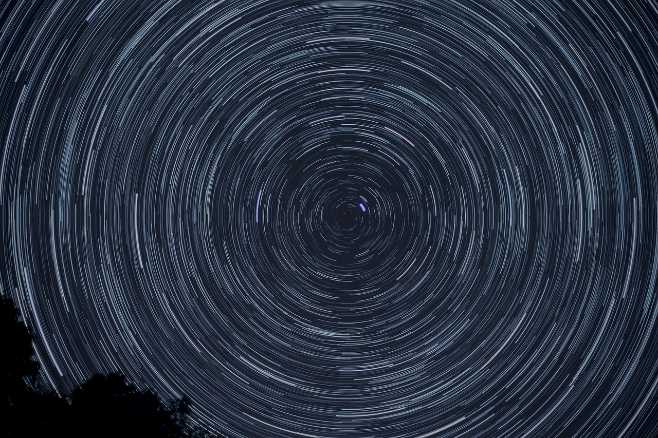 star trails night night sky stars rotation starry sky dark light streaks motion nature pattern round sky space long exposure