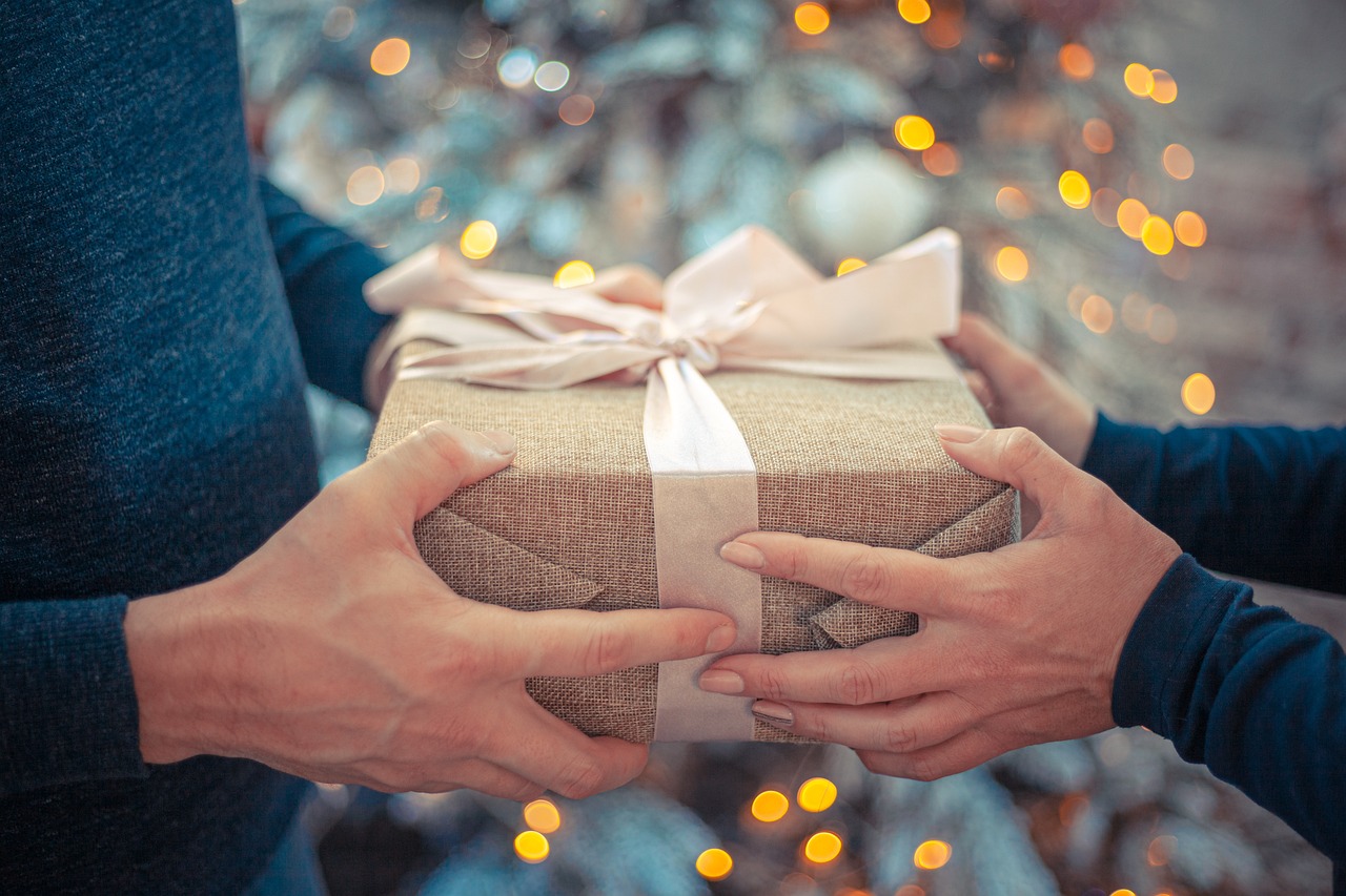 christmas background christmas wallpaper gift new year's eve congratulation christmas holiday winter joy happiness christmas tree surprise
