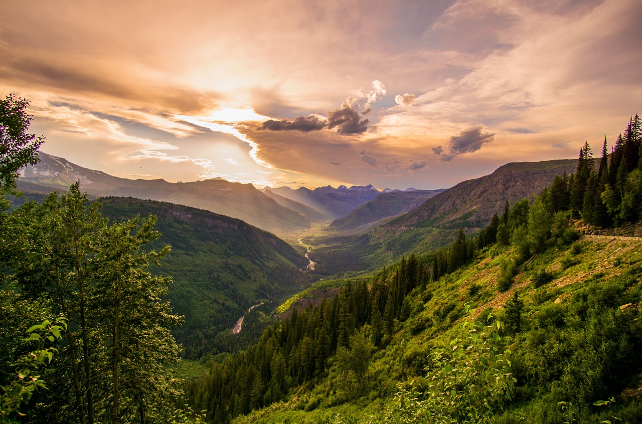 mountains trees sky clouds mountainous mountain ranges mountain landscape cloudy conifers dawn daylight fir trees idyllic landscape nature pine trees scenic valley woods mountains mountains mountains mountains valley valley valley valley valley