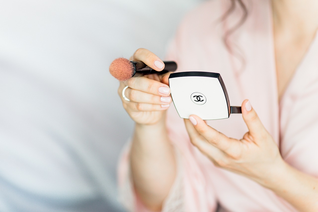 chanel cosmetics makeup brush hands chanel cosmetics cosmetics makeup makeup makeup makeup makeup