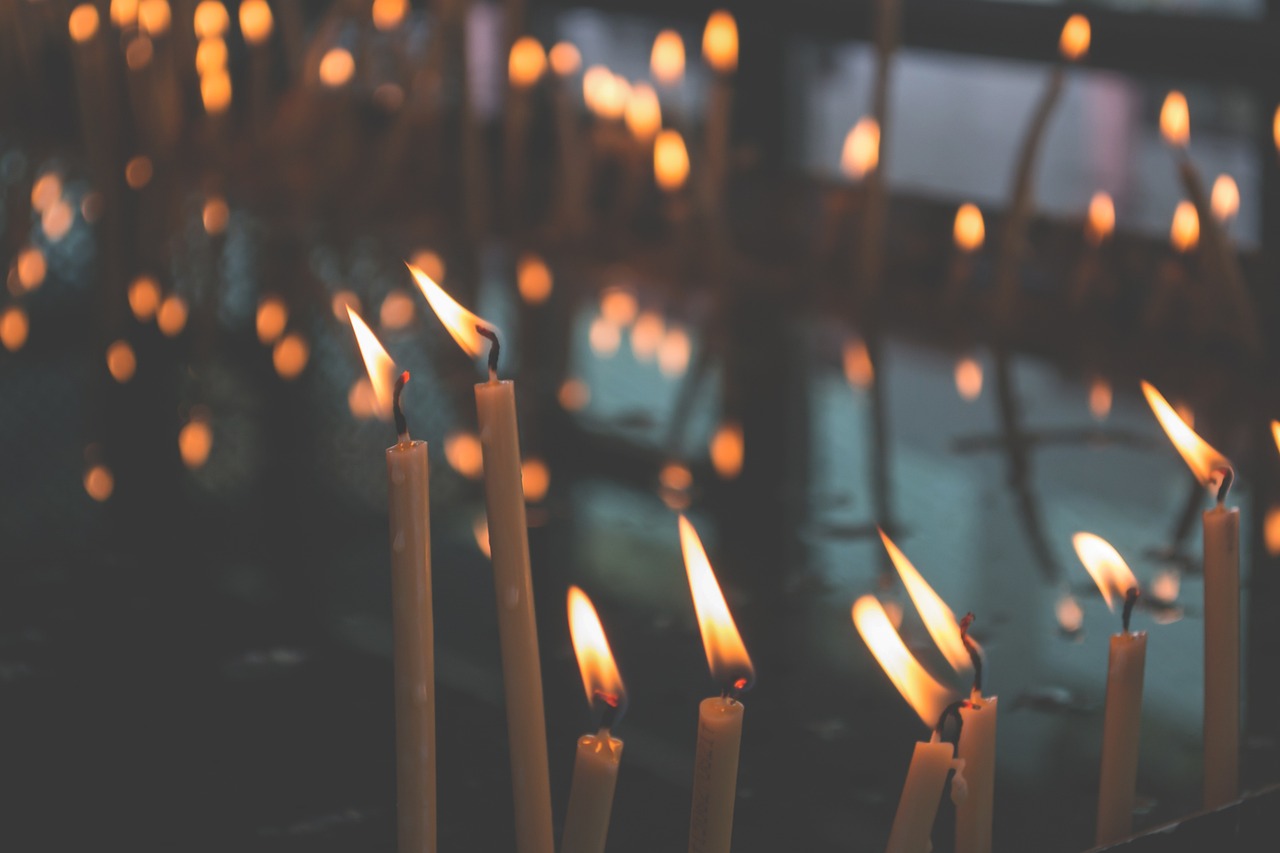 candles light burn burning candles blur burning candlelights dark flames flaming candle wicks lighted religious wax candles candles candles candles candles blur religious